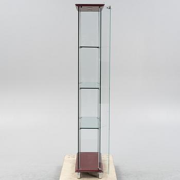 A glass display cabinet, Cattelan, Italy, 21st Century.