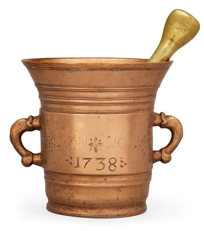 A bronze mortar dated 1738.