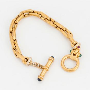 BRACELET, 18K gold, an anchor-link with cabochon rubies, sapphires and emeralds.