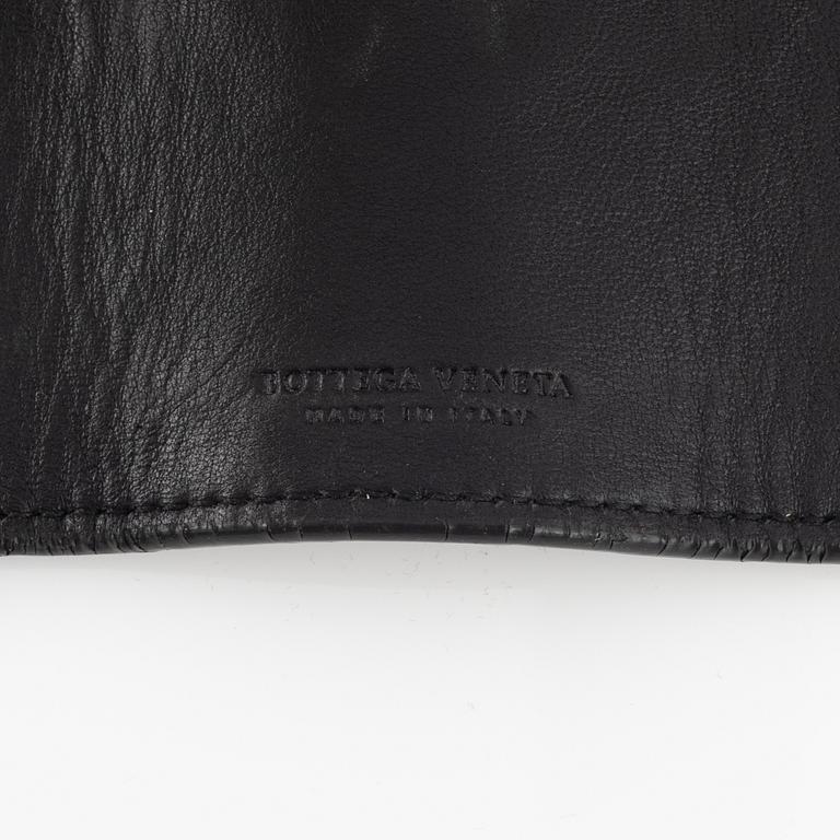 Bottega veneta, a black intrecciato wallet and key case.