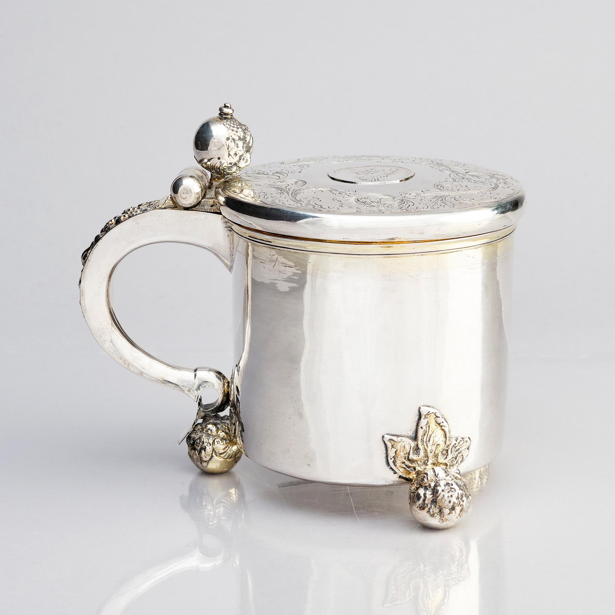 A Swedish 17th century parcel-gilt tankard, mark of Johan Nützel, Stockholm 1708.