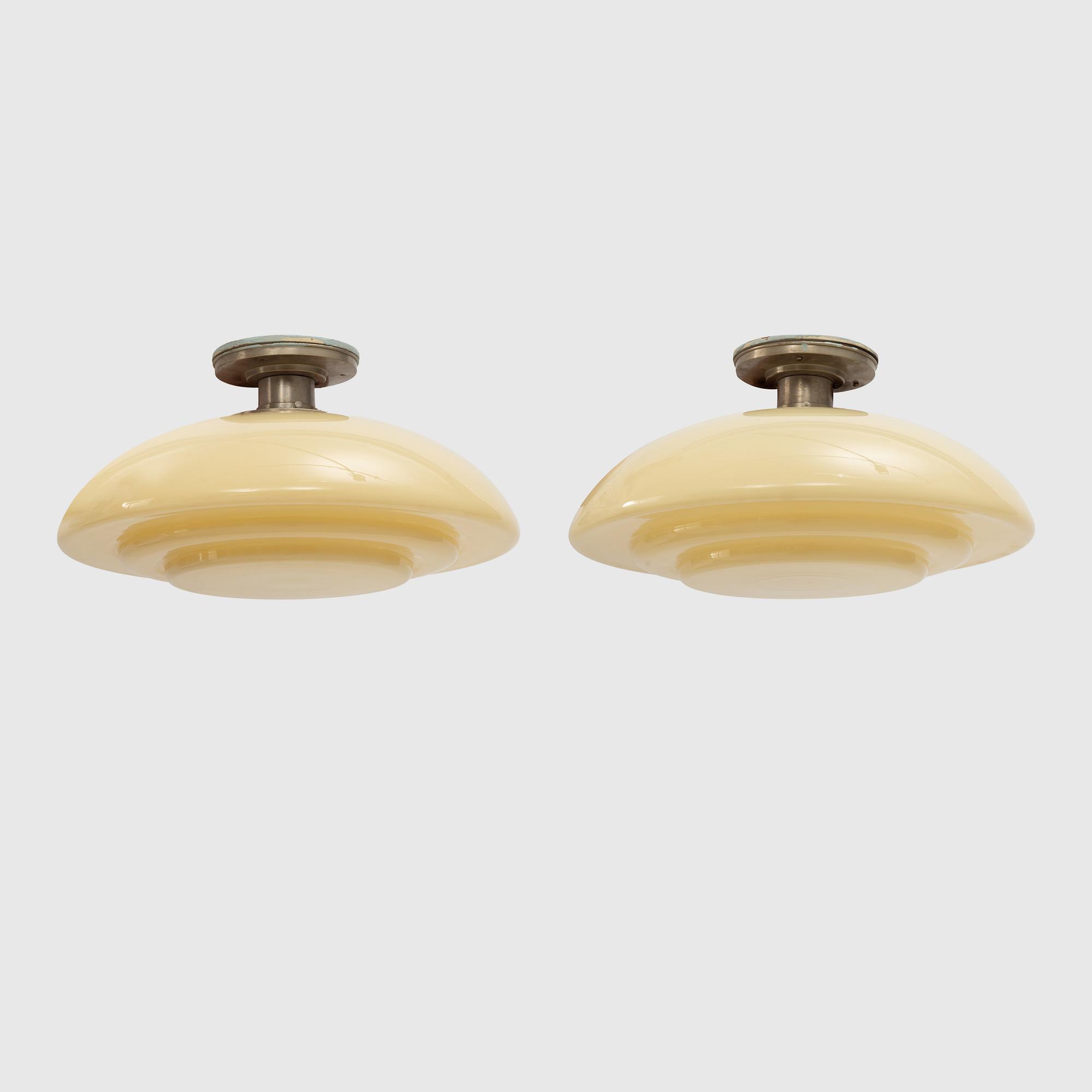 Harald Notini, a pair of ceiling lamps, model "10755", Arvid Böhlmarks Lampfabrik, 1930s.