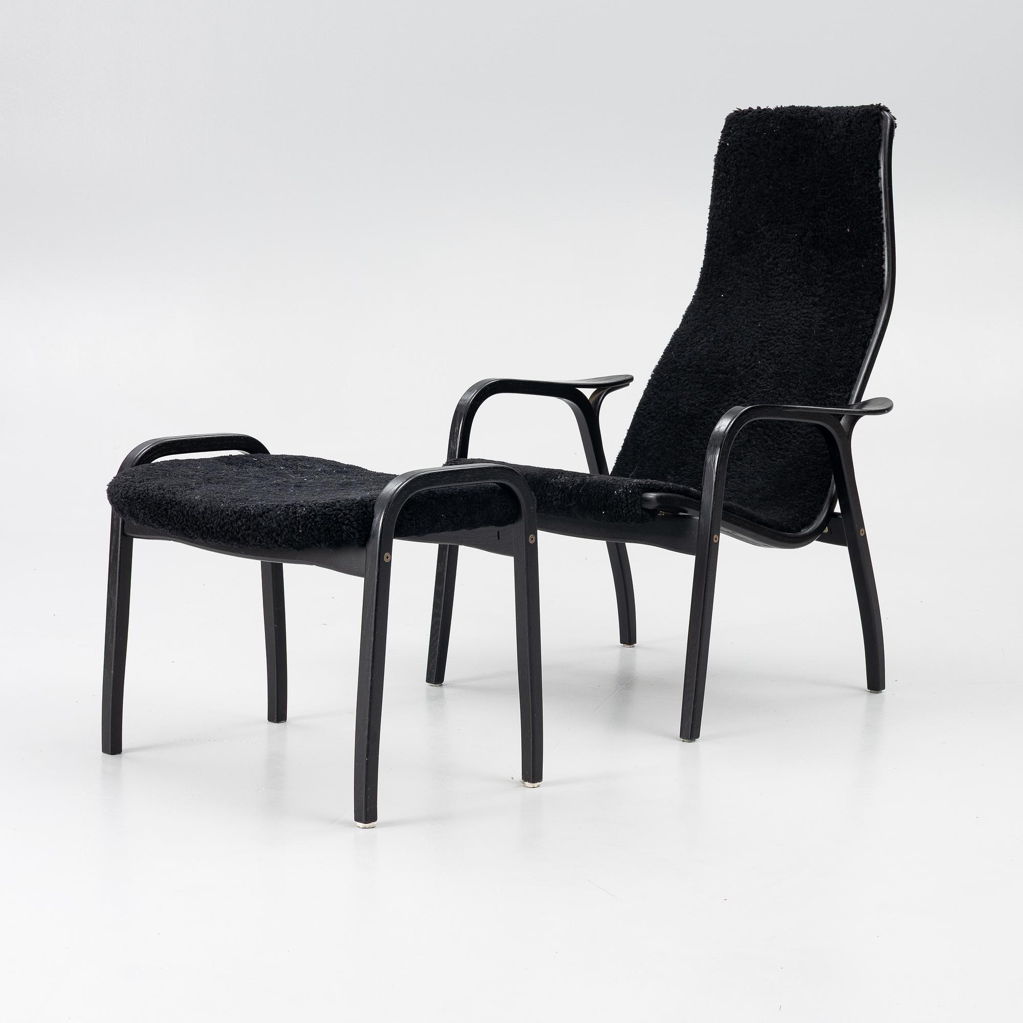 Yngve Ekström, a 'Lamino' easy chair with foot stool, Swedese 2010.