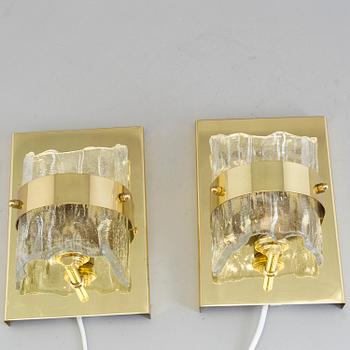 A pair of wall lights marked Fred L. Thiesen, 20th century.