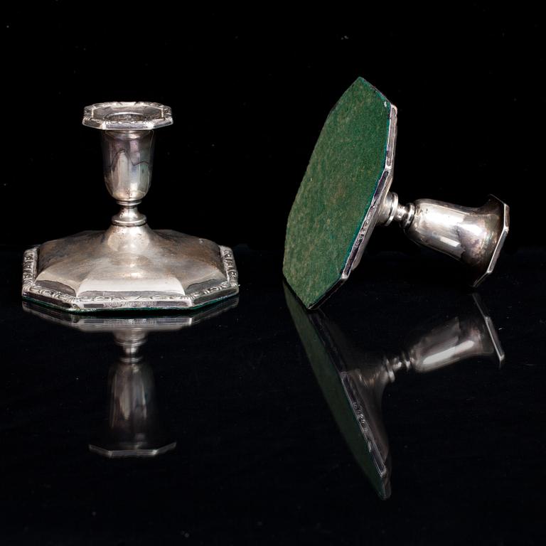 LJUSSTAKAR, ett par, silver. 1900-talets första hälft.