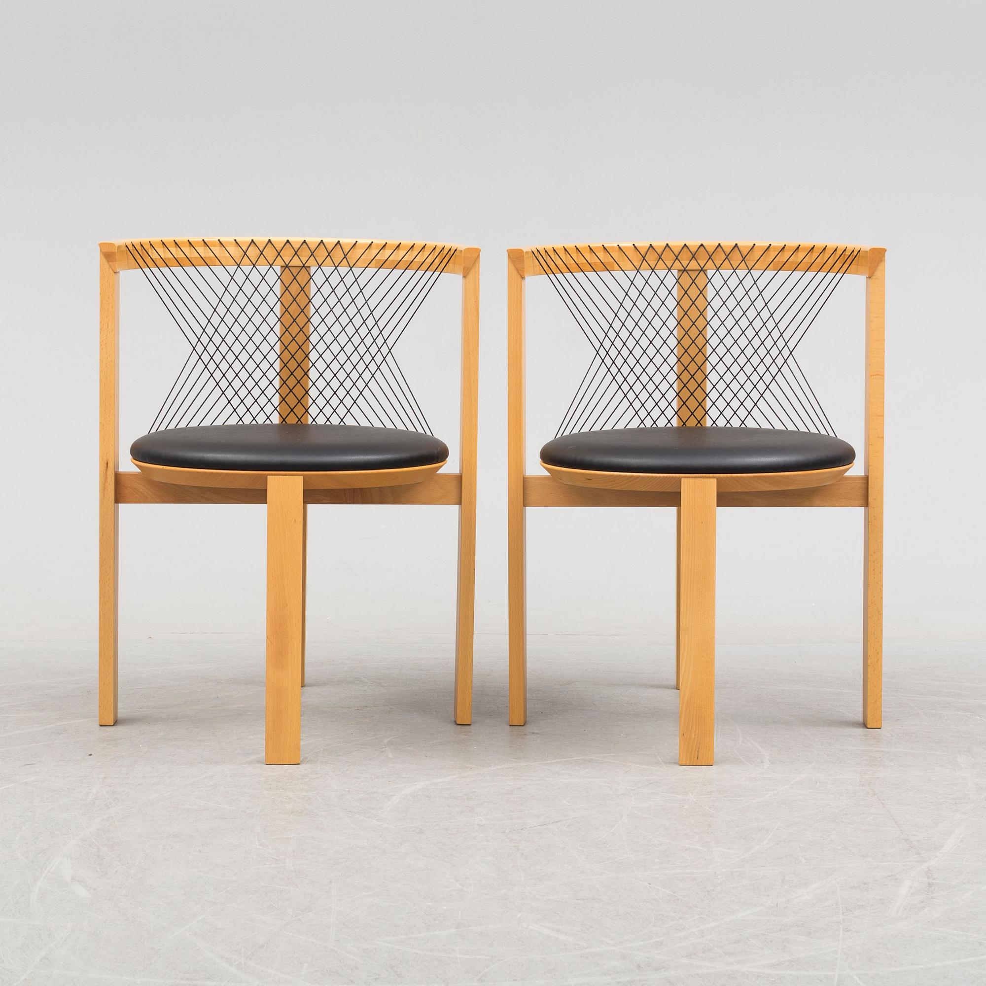 a pair of 'String Chairs' by Niels Jörgen Haugensen, Tranekaer Furniture, Denmark, late 20th century.