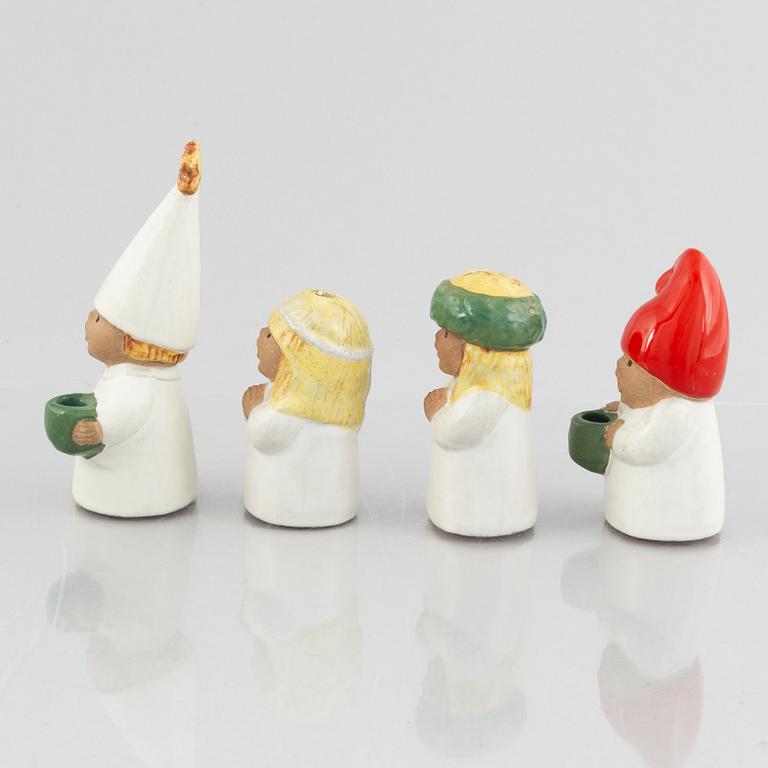 Lisa Larson, four "Advent" stoneware figurines/candlesticks, Gustavsberg, Sweden.