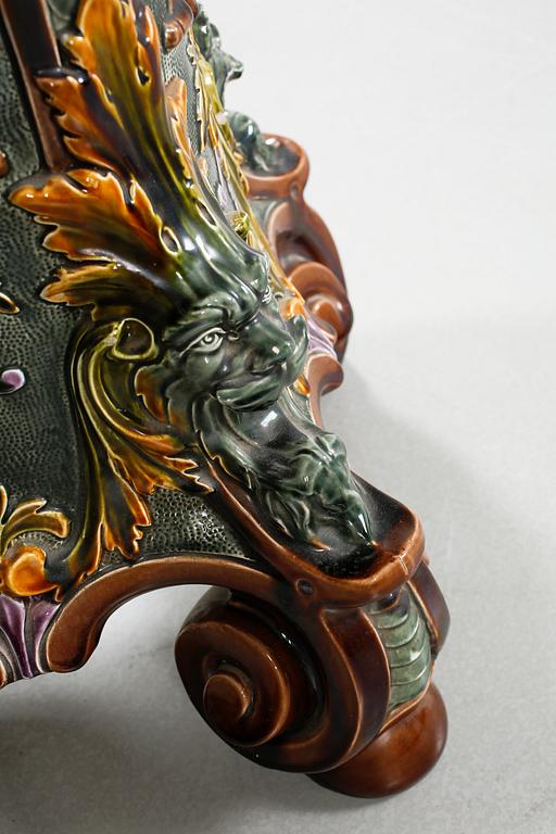 A pot on a pedestal in ceramics made by Rörstrand in the years between 1884-1890.