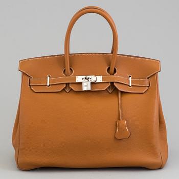 A gold togo Birkin 35 handbag by Hermès from 2004.