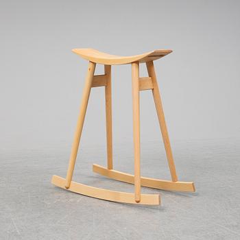 PER SUNDSTEDT, a wood rocking stool from Pyra.