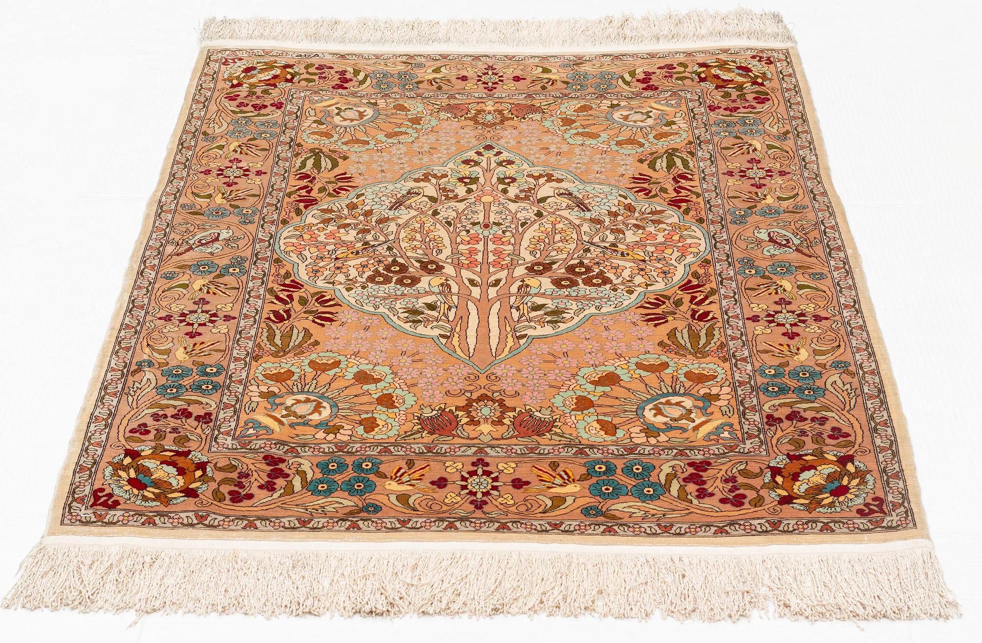A rug, Old, silk Hereke, ca 128 x 90 cm.
