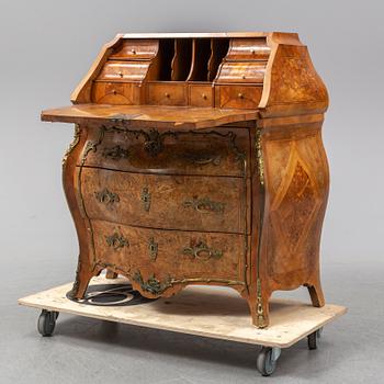 A 19th century rococo style secretaire.