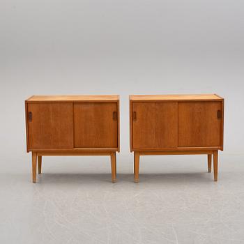 A pair of 1950s/1960s teak veneer sideboards.