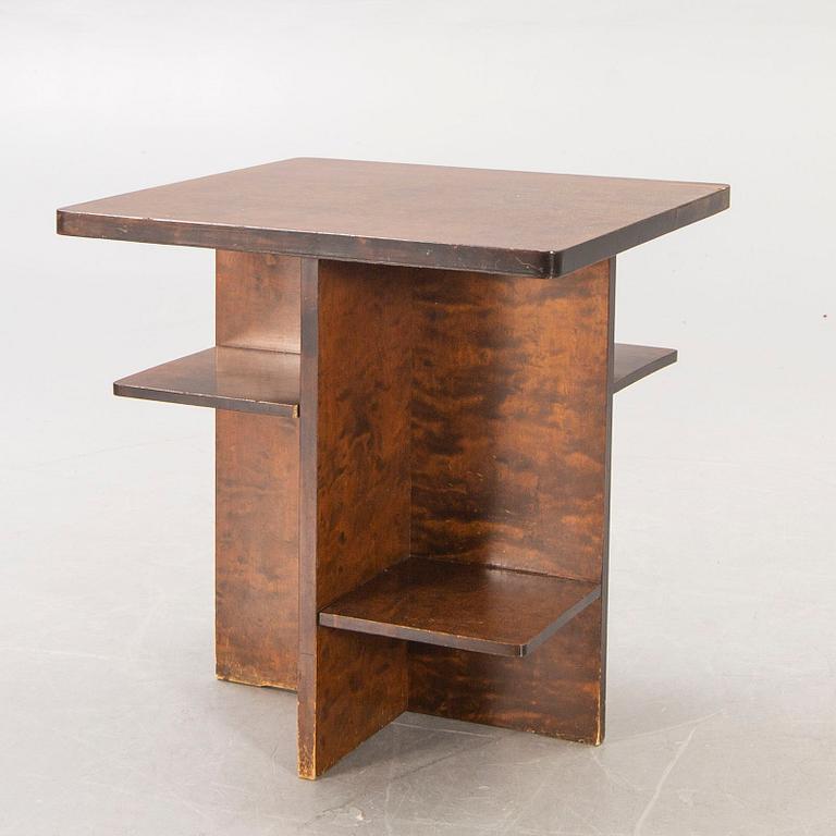 A 1930s-40s birch table.