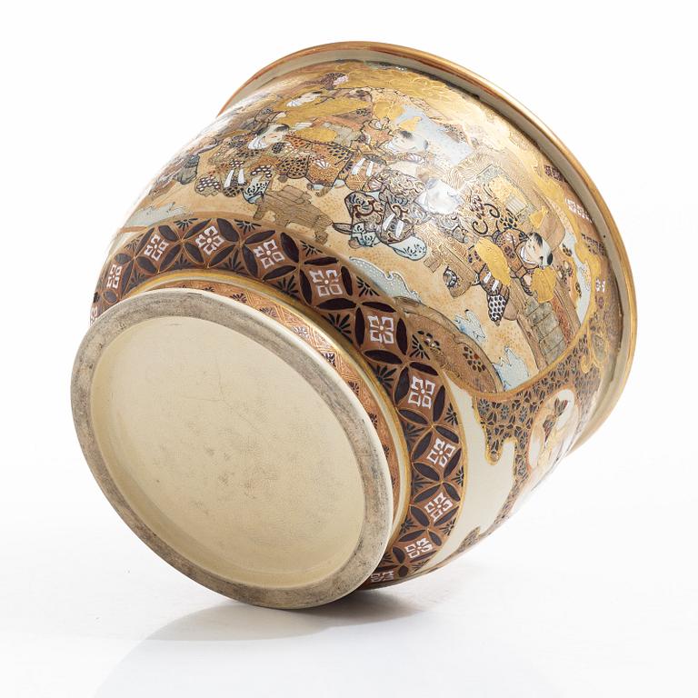 A Japanese satsuma figural flower pot, early 20th century.