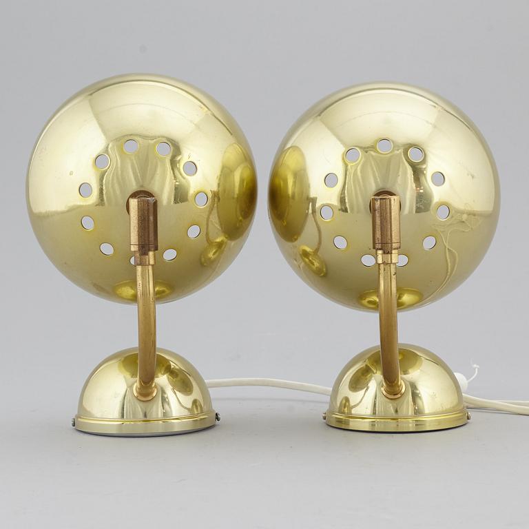 A pair of 1970's wall lamps.