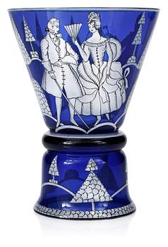 741. A Wiener Werkstätte blue glass goblet in a design by Josef Hoffmann. Signed WW.