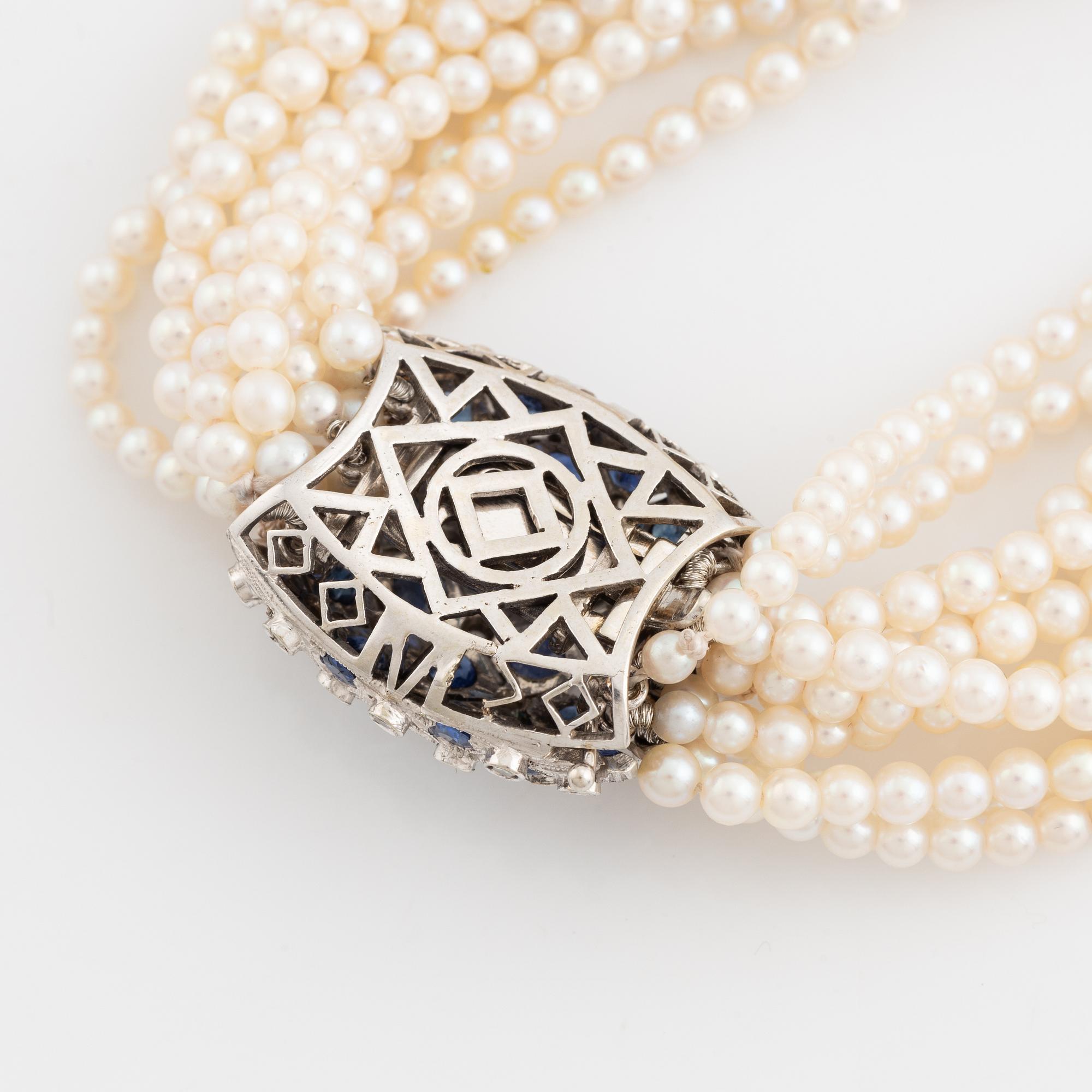 Cultured pearl bracelet, eleven strand, clasp white gold with sapphire and diamonds.