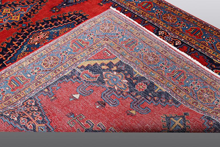 A CARPET, Wiss Signed Sharbani.  327 x 227 cm.