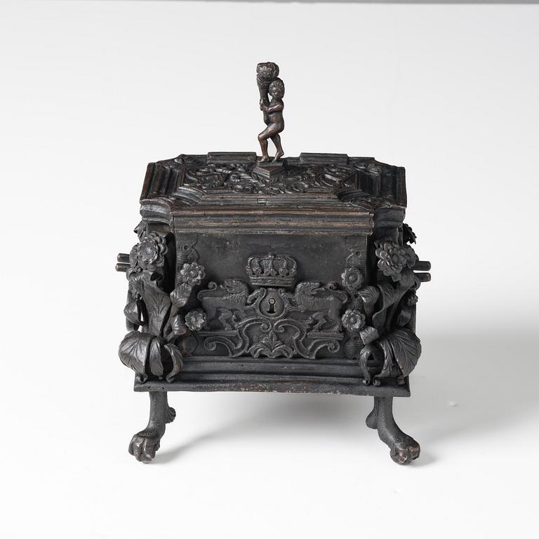 A South-German, presumably Nuremberg, Baroque iron and steel strongbox, later part of the 17th century.