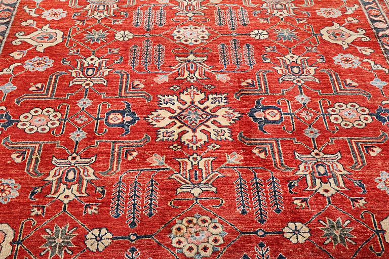 A Kazak carpet, c. 325 x 240 cm.