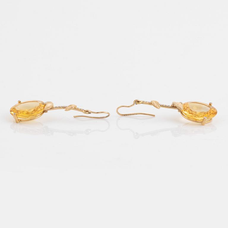 Large citrine and brilliant cut diamond earrings.