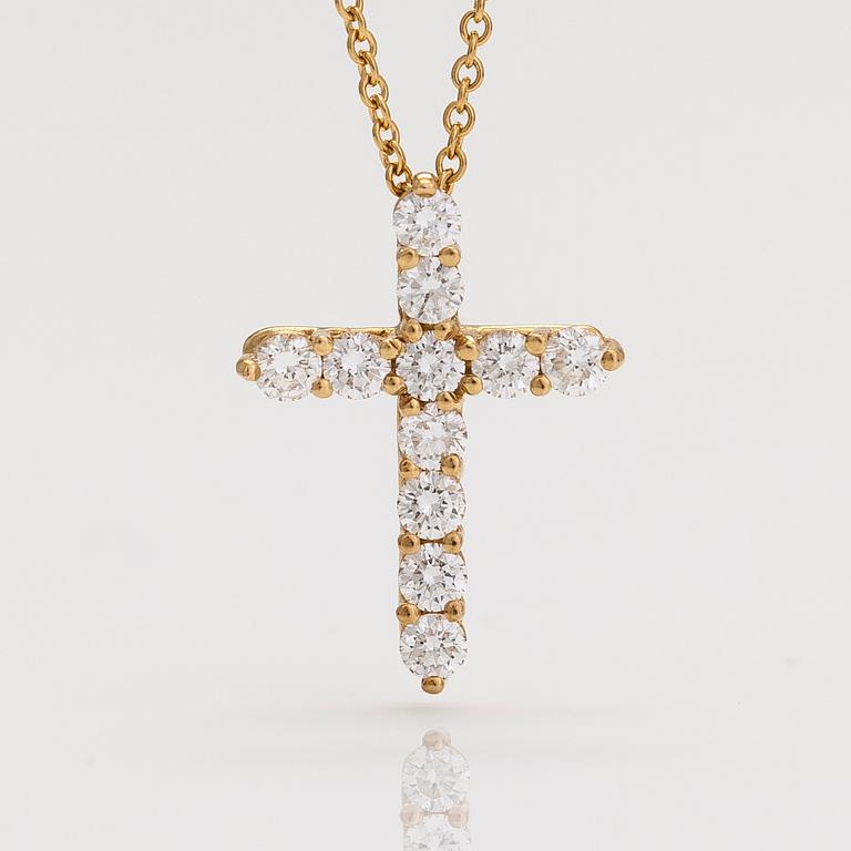 Tiffany & Co, an 18K gold cross pendant necklace with diamonds, ca. 0.42 ct in total.