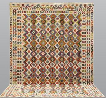 A Kilim carpet, approx. 342 x 295 cm.