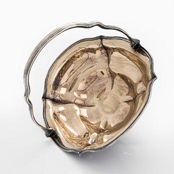 A parcel-gilt sweetmeat basket, Saint Petersburg 1851, master mark HH, Nikolai Nikitin or Henrik Hacklin.