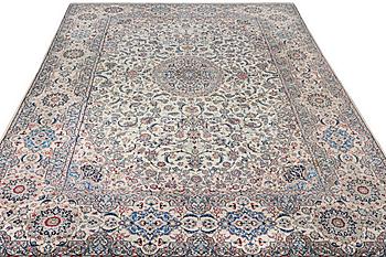A Nain carpet, part silk, 9 laa, c. 453 x 298 cm.