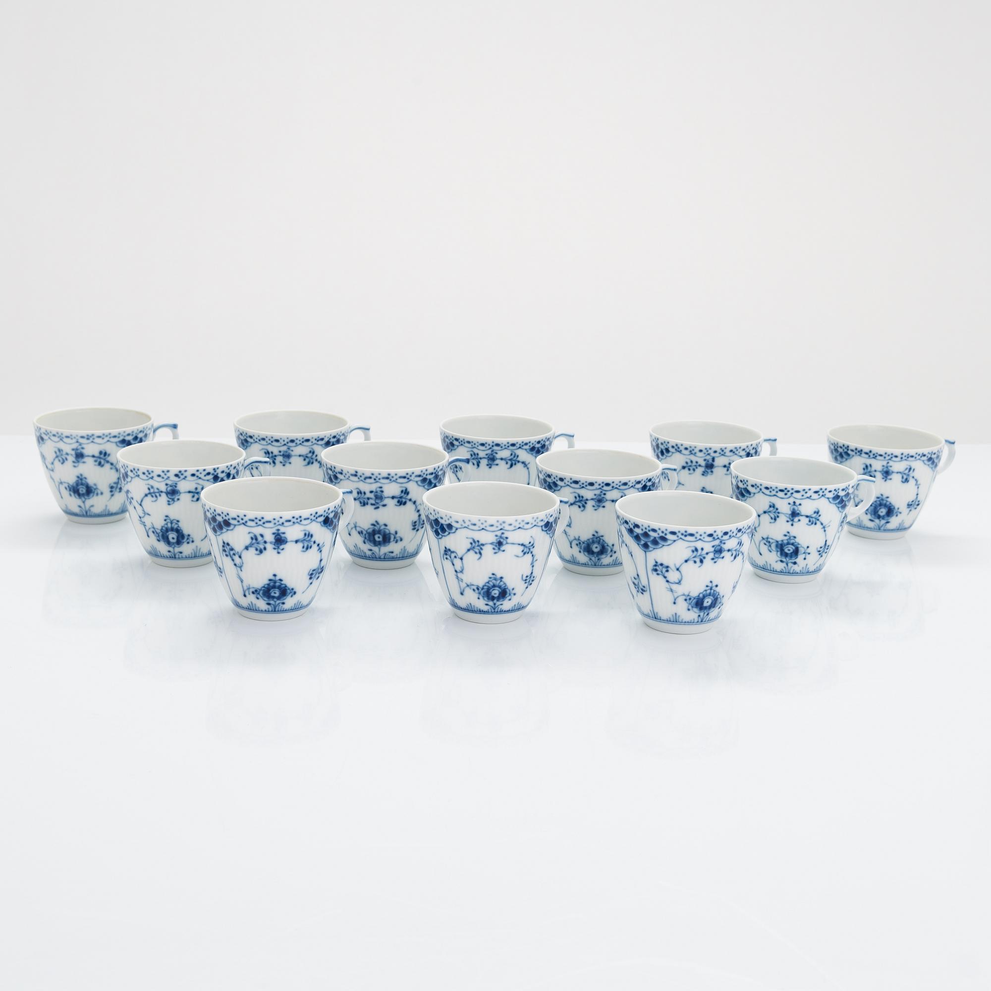 A 31-piece Royal Copenhagen 'Musselmalet' porcelain coffee set.