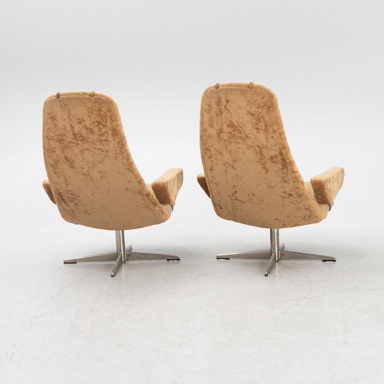 Alf Svensson, swivel armchairs, a pair, "Contourett Roto", Dux, second half of the 20th century.