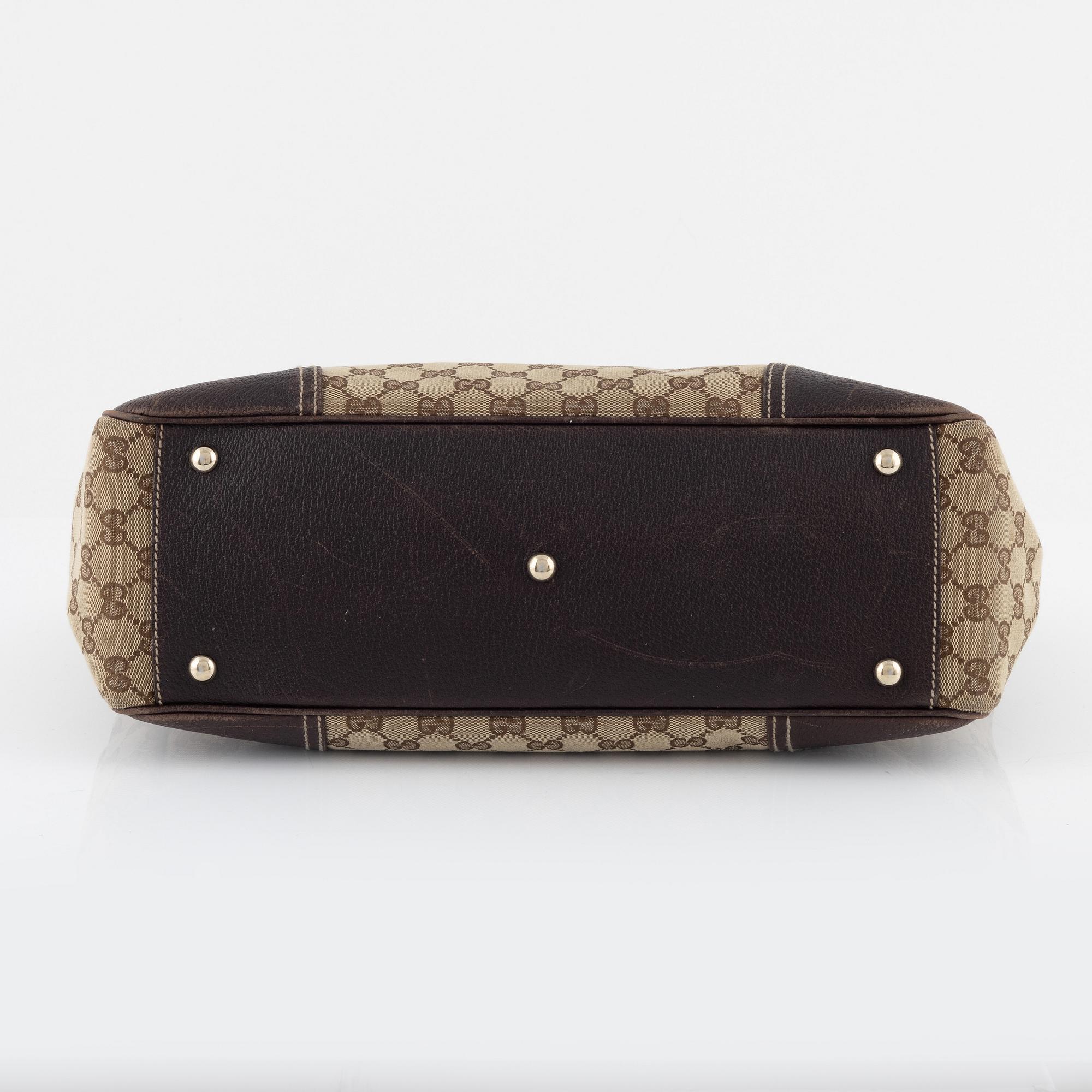 Gucci, a monogram canvas handbag.