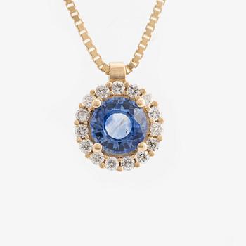 Pendant with chain in 18K gold with a faceted sapphire and round brilliant-cut diamonds.