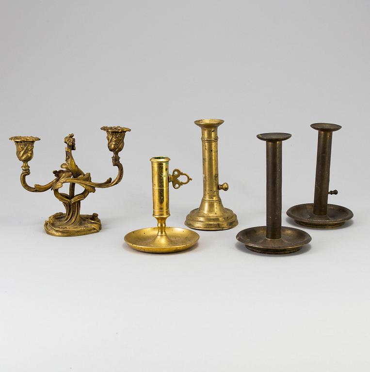 A set of five 1700-/1800s candlesticks.