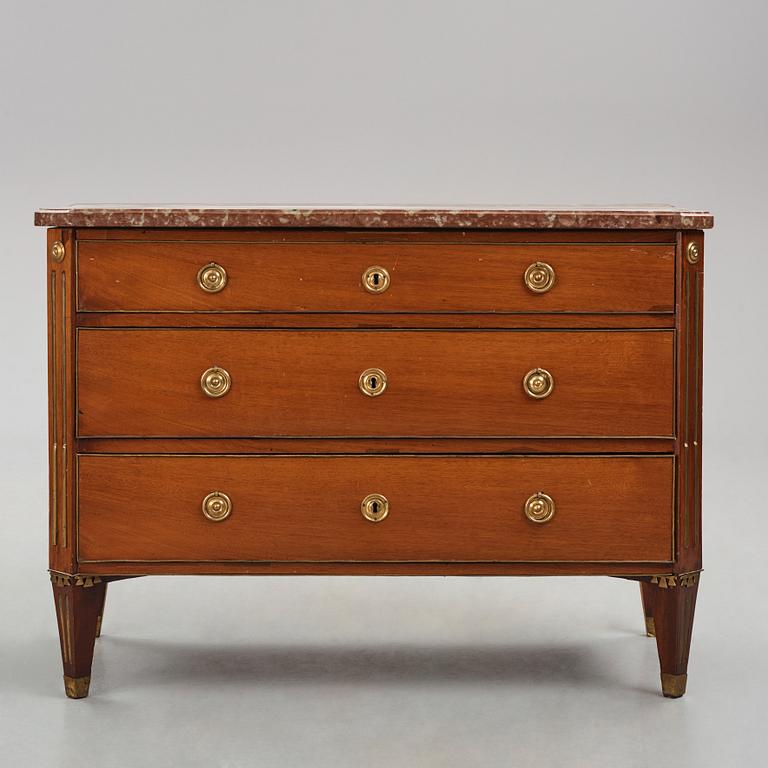 A late Gustavian mahogany commode in the manner of A. Scherling, late 18th century.