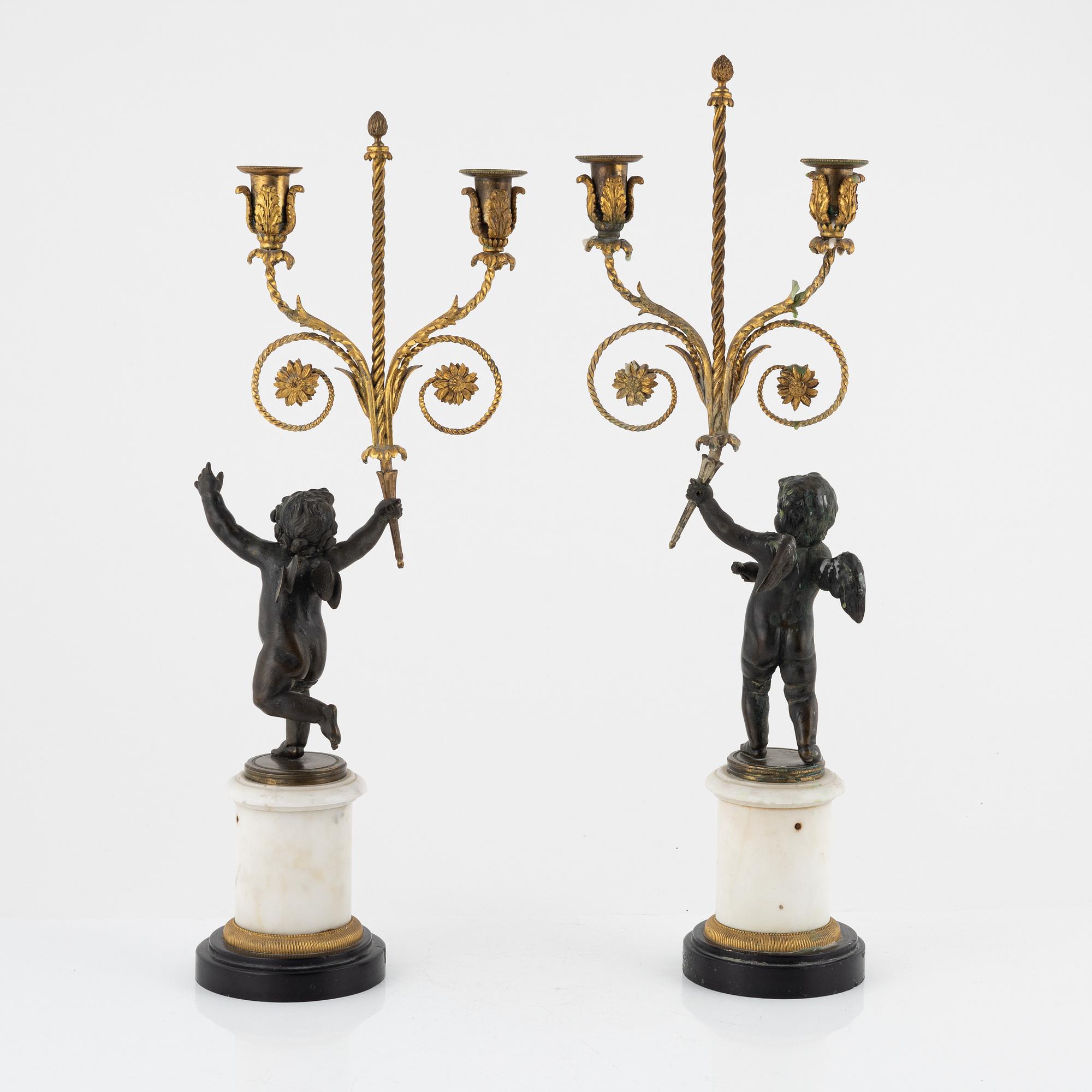 A pair of Louis XVI style candelabra, 19th Century.