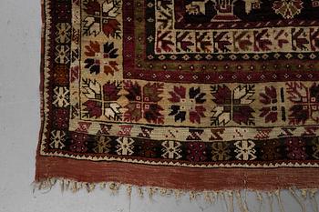 A carpet, antique Avanos, ca 190 x 136 cm (as well as 5 and 6 cm of flat weave on each end.).