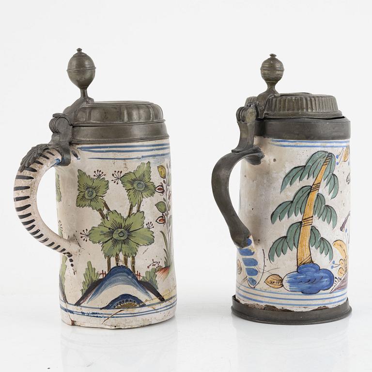 Two earthenware tankards, Germany, 18th century.