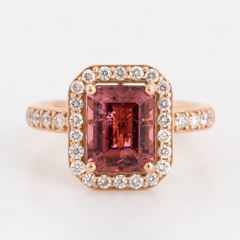 Emerald-cut pink tourmaline and brilliant-cut diamond ring.