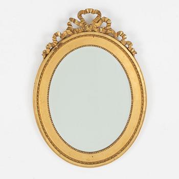 A Gustavian style mirror, 20th century.