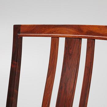 Bertil Fridhagen, a rosewood-veneered dining table with four chairs, BOdsfors, Sweden, 1960's.