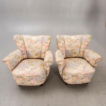 A pair of 1940s easy chairs.