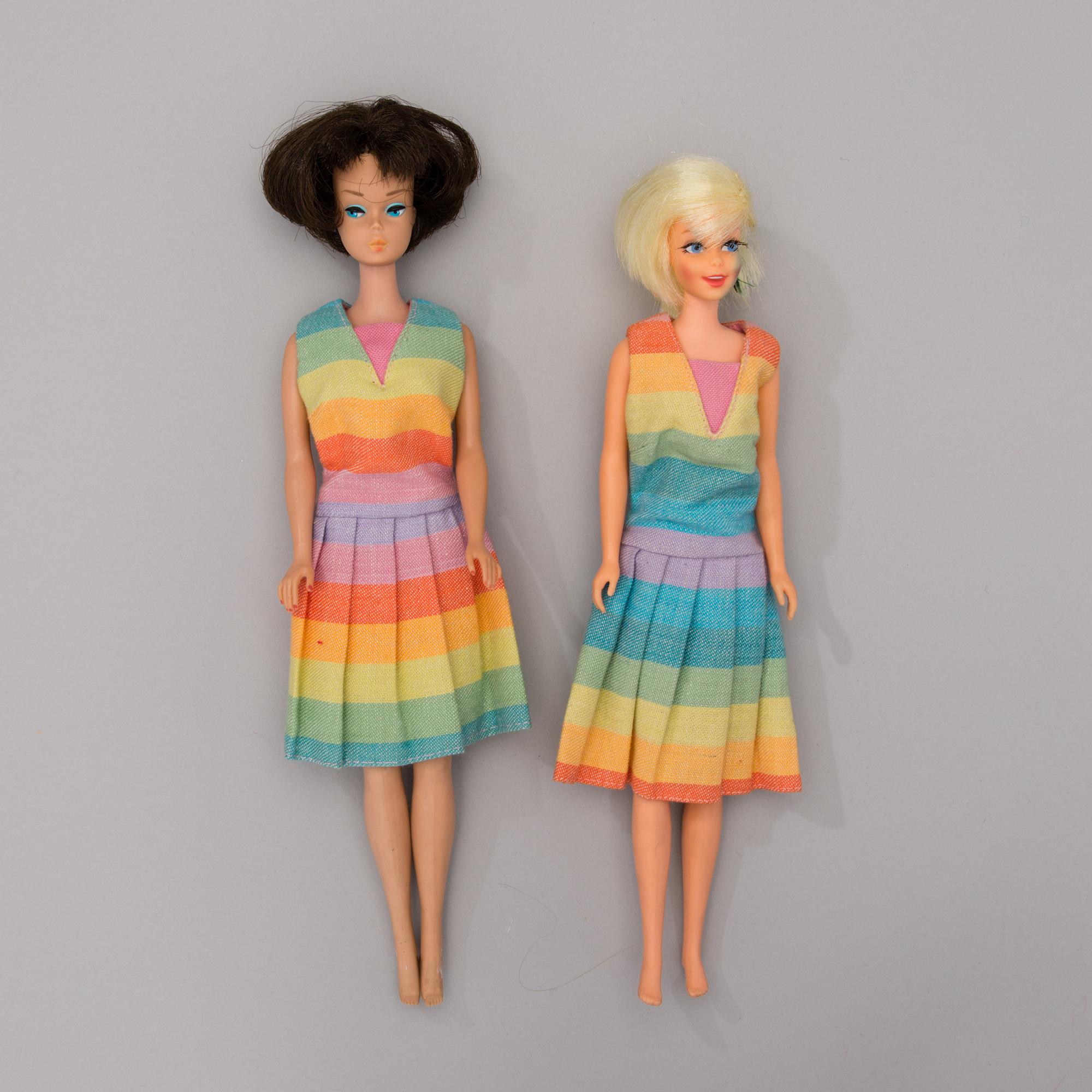 Two dolls, Barbie and Francie, with clothes and in original case, Mattel 1960s.