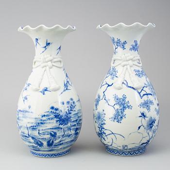 A matched pair of blue and white vases, Japan, early 20th Century.
