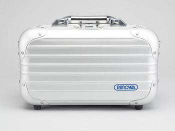 A set of three Rimowa bags later part of the 20th century.