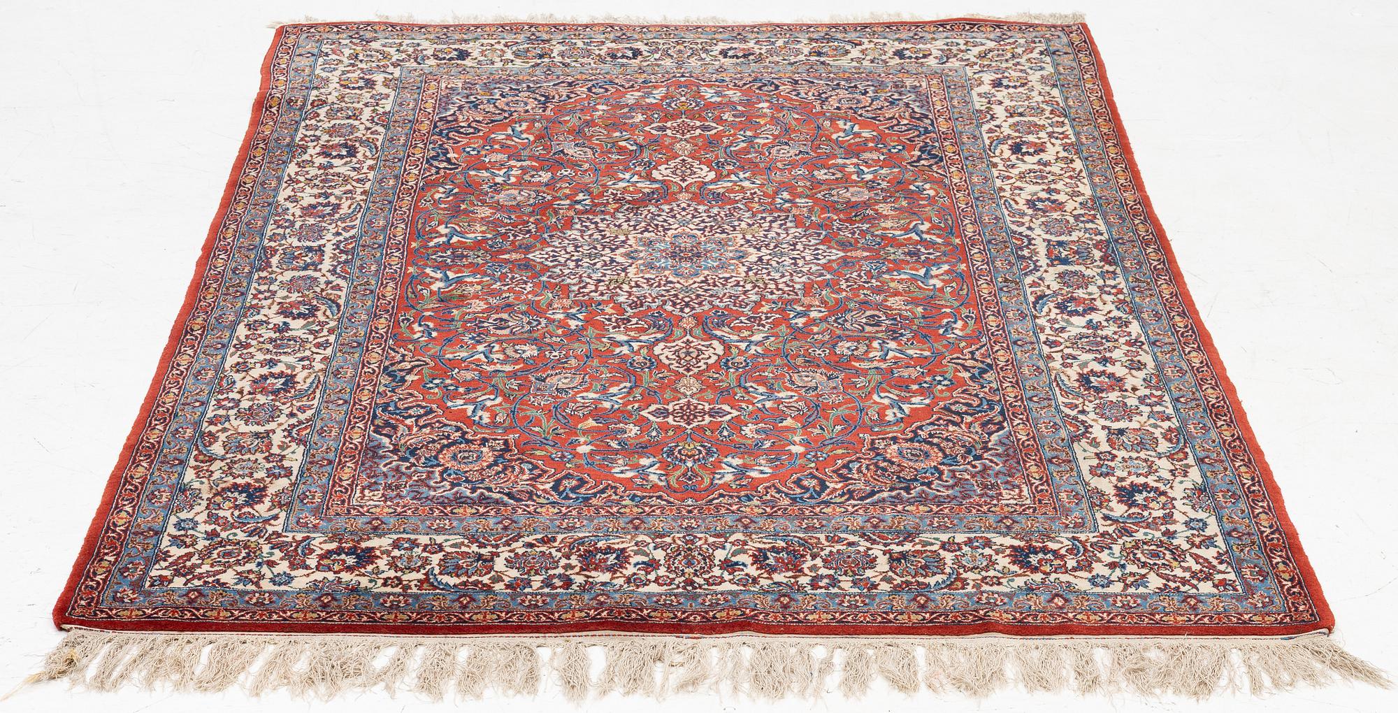 An Isfahan rug, c. 225 x 150 cm.