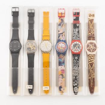 Parti med 21 Swatch-klockor, gummiband och klocklitteratur, "No Reserve".