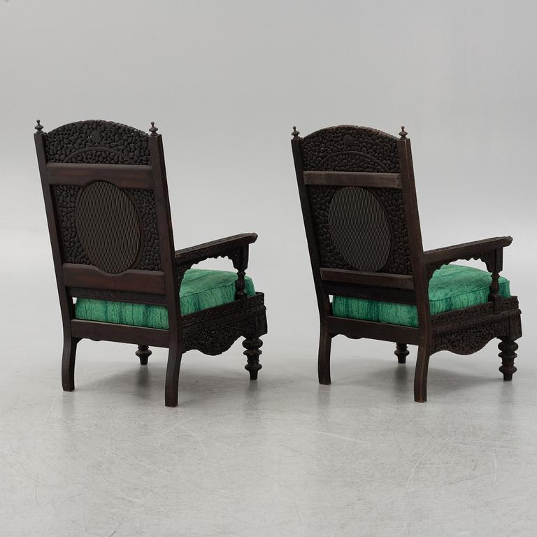 A pair of Angloindian carved chairs, India, 19th century, in so called 'Bombay style'.