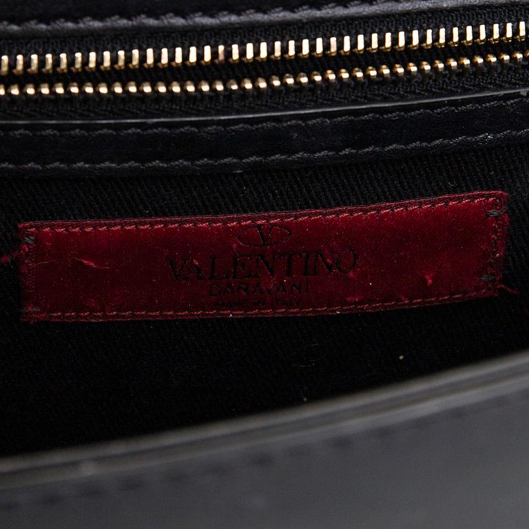 Valentino Garavani, a 'Glam Lock' bag.